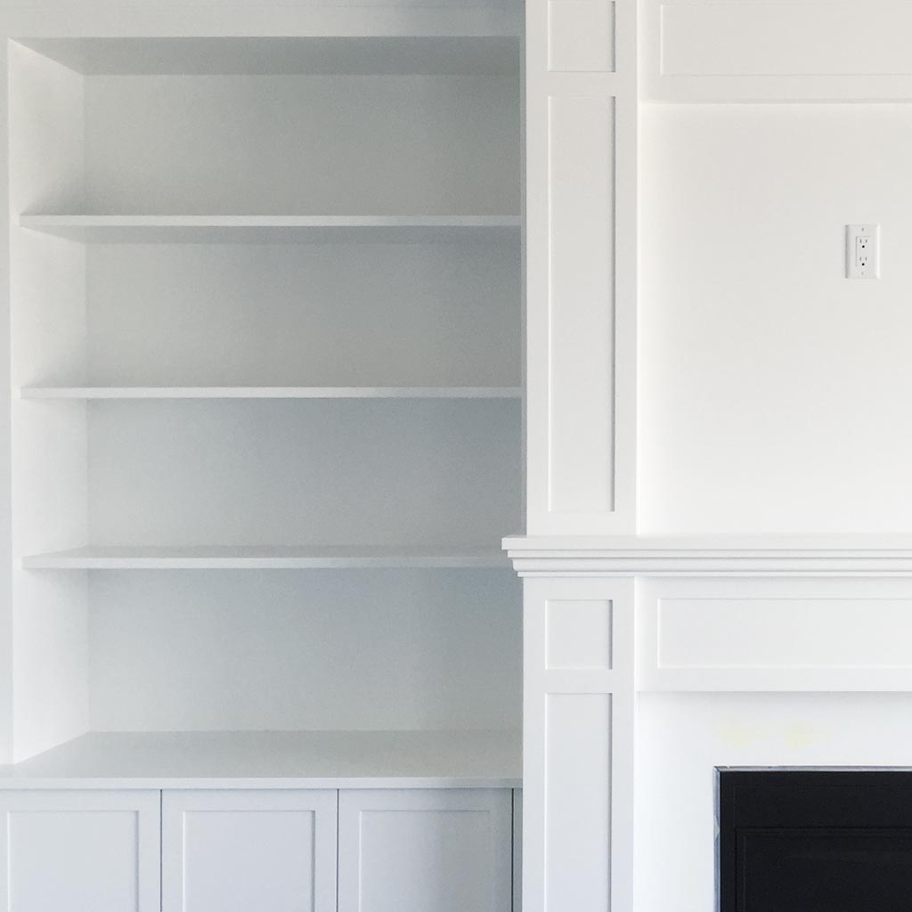 Saskatoon custom built fire place shelving feature wall